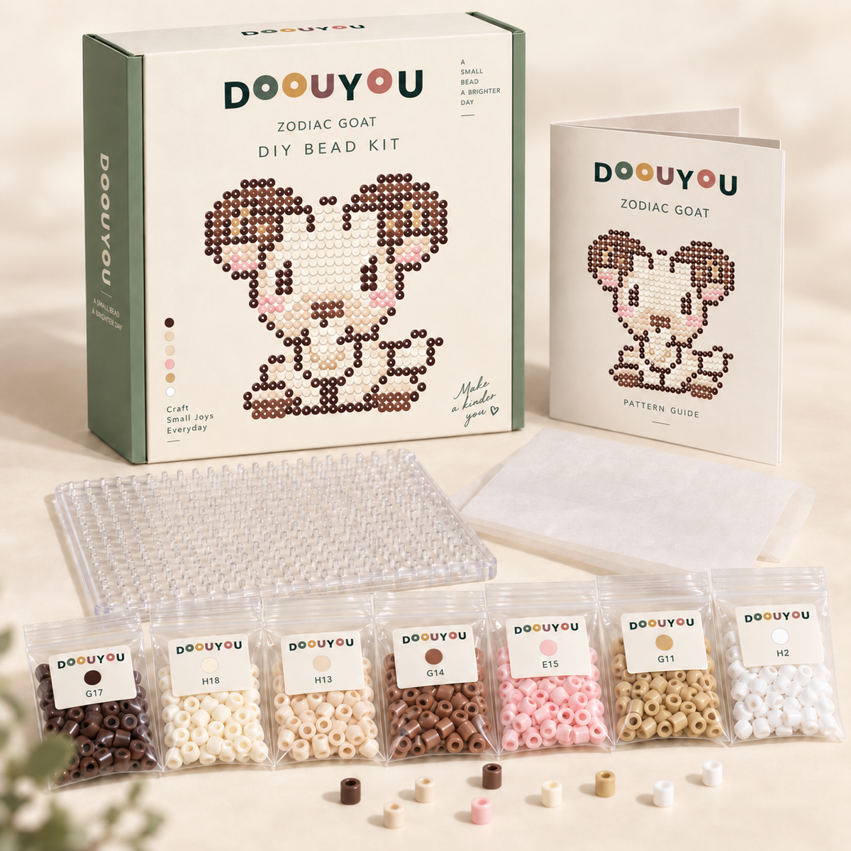 DOOUYOU Zodiac Goat DIY kit concept: packaging, color-sorted beads, pegboard, tweezers, ironing paper and chart; digital illustration, not a product photo.