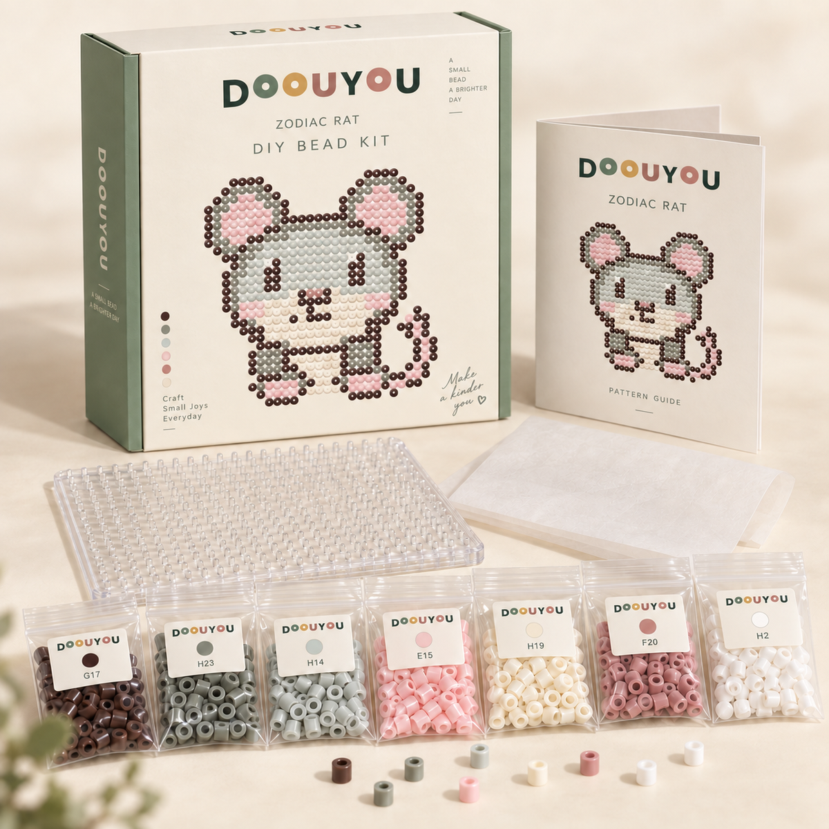 DOOUYOU Zodiac Rat DIY kit concept: packaging, color-sorted bead bags, pegboard, ironing paper and chart; digital illustration, not a product photo.
