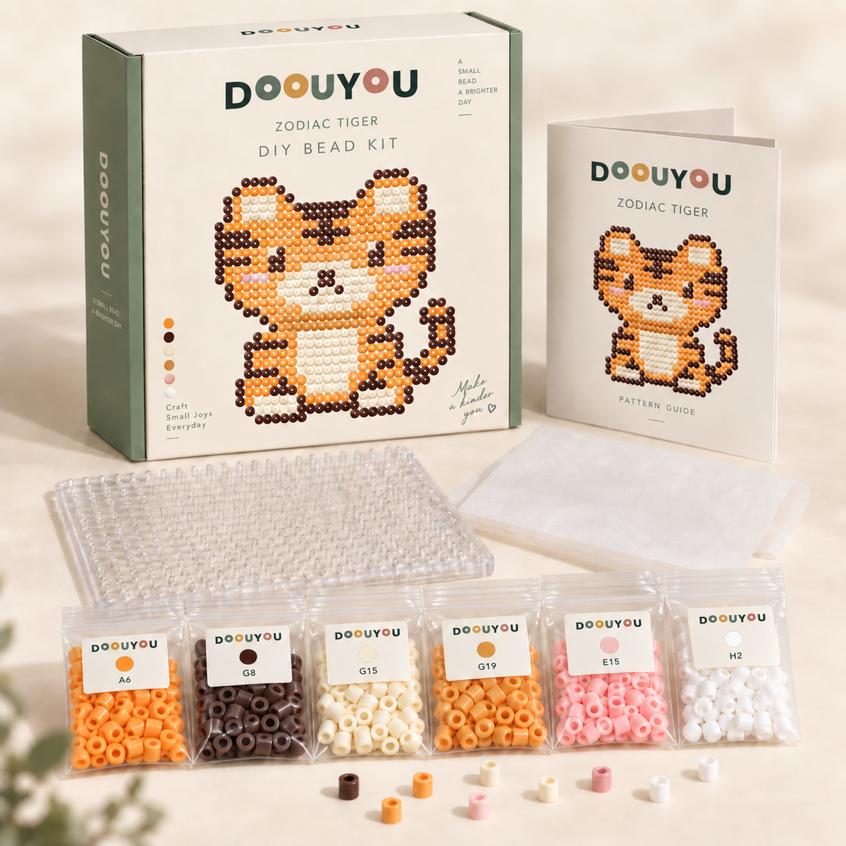 DOOUYOU Zodiac Tiger DIY kit concept: packaging, color-sorted bead bags, pegboard, ironing paper and chart; digital illustration, not a product photo.
